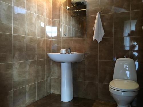 Koupelna v ubytování Hotel Simpatia