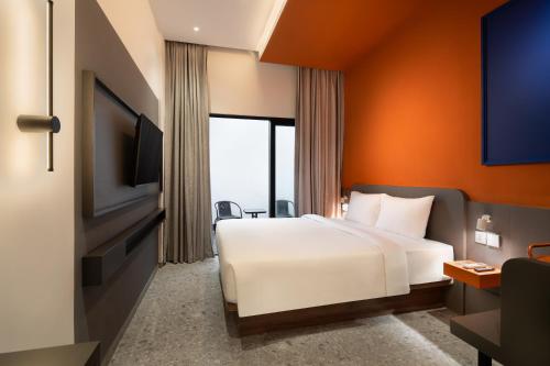 Postel nebo postele na pokoji v ubytování D'Capstone Guesthouse