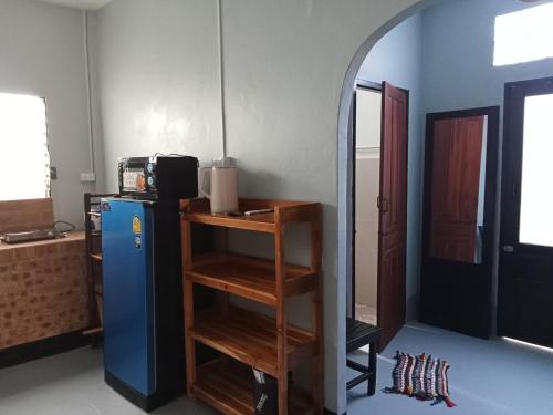 Llit o llits en una habitació de KEZ Residence