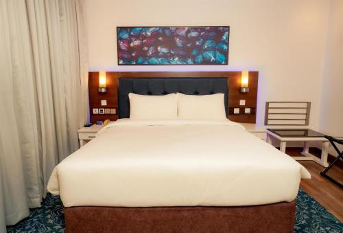 Postel nebo postele na pokoji v ubytování Radisson Blu Kochi