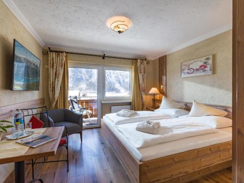 Postel nebo postele na pokoji v ubytování Das Rotspitz Adults - only