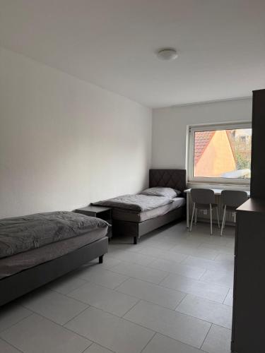 Postel nebo postele na pokoji v ubytování Monteurwohnung Lampertheim