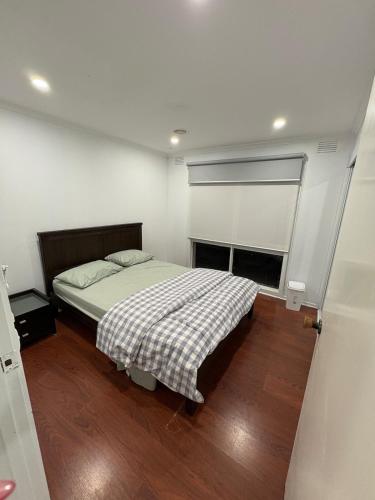 En eller flere senge i et værelse på Park Villa in Mulgrave