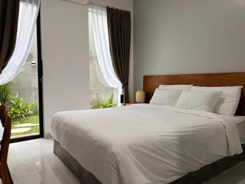 Postel nebo postele na pokoji v ubytování Laziela Guest House