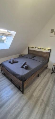 En eller flere senge i et værelse på T2 Cosy - Coeur Amiens