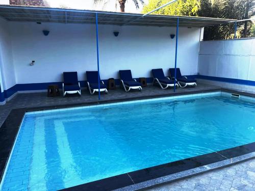 Swimmingpoolen hos eller tæt på Ali Baba Guest House