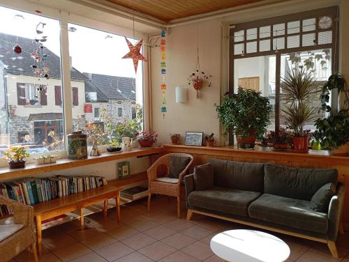 Posezení v ubytování Gîte d'étapes et tables d'hôtes, Le Chalet d'Ambre