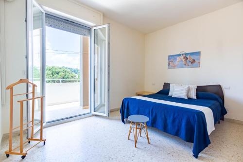 Giường trong phòng chung tại Appartamento Attico Bellariva - MyHo Casa