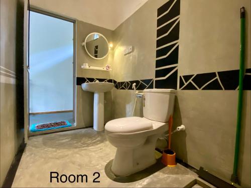 Koupelna v ubytování Bird garden Midigama