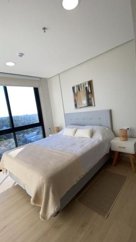 Llit o llits en una habitació de Matrisa Suite 15