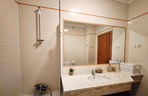 Et badeværelse på 4AO Brisa Mar - Casas & Papeis