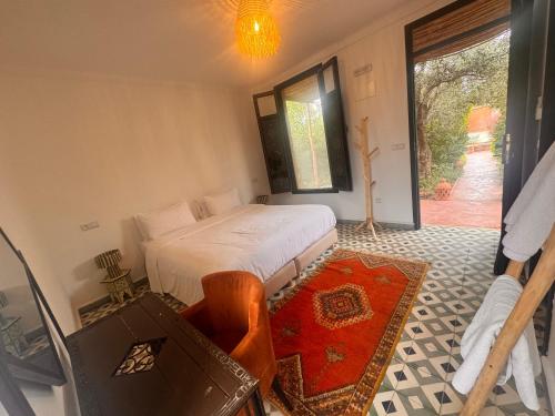 Postel nebo postele na pokoji v ubytování Ecolodge tahannaout