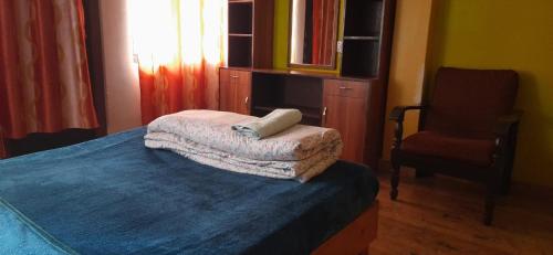 Llit o llits en una habitació de Apple Seed Lodge
