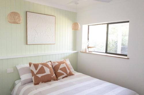 Ένα ή περισσότερα κρεβάτια σε δωμάτιο στο Studio11 - Vincentia