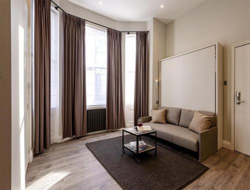 Et opholdsområde på Stunning ground floor studio 5 min to tube