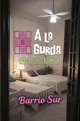Giường trong phòng chung tại A la Gurda Hostel - Barrio Sur