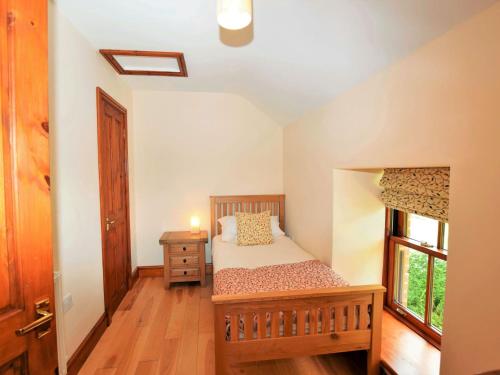 En eller flere senge i et værelse på 3 Bed in Bancyffordd LLWYD