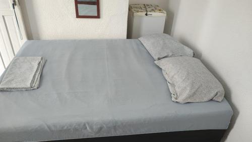 En eller flere senge i et værelse på Pousada vittoria