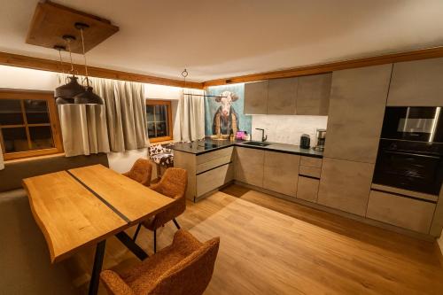 Kuchyň nebo kuchyňský kout v ubytování Appartments Kasermandl