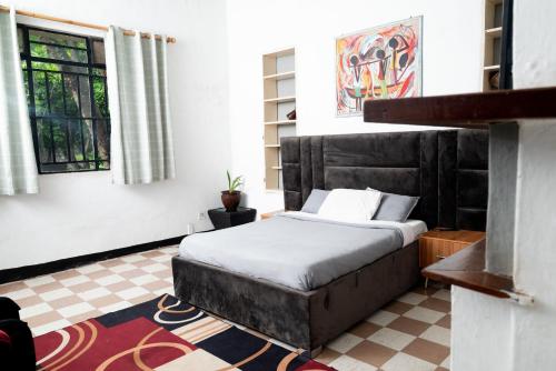 Postel nebo postele na pokoji v ubytování Henderson street lodge