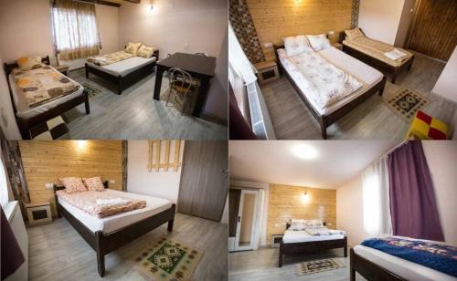 En eller flere senge i et værelse på Pensiunea 7 Brazi