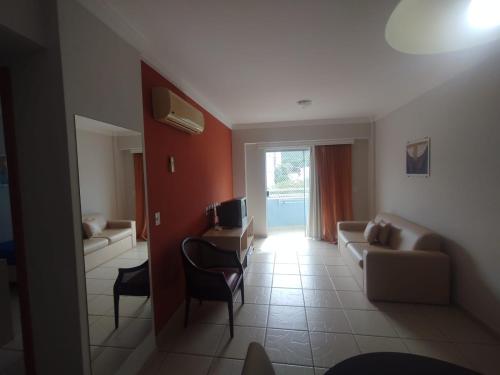 Ein Sitzbereich in der Unterkunft Apart Flat Aguas da Serra