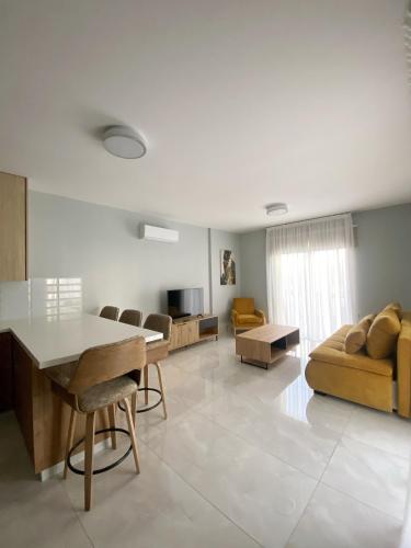 Et opholdsområde på STAY Andriana Apartment