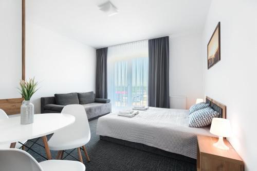 Postel nebo postele na pokoji v ubytování Resort Holiday Home - SPA&Wellness by Noclegi Renters