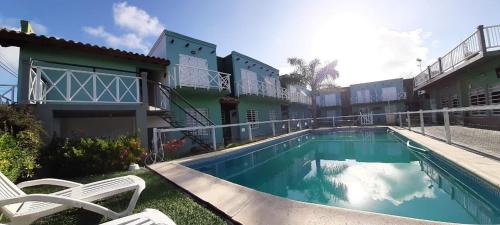 Swimmingpoolen hos eller tæt på Complejo Hueney Departamentos