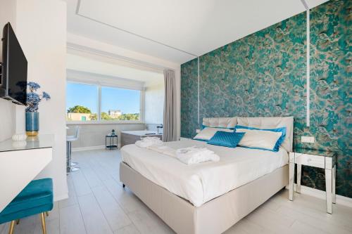 Postel nebo postele na pokoji v ubytování Suite La Perla Nera