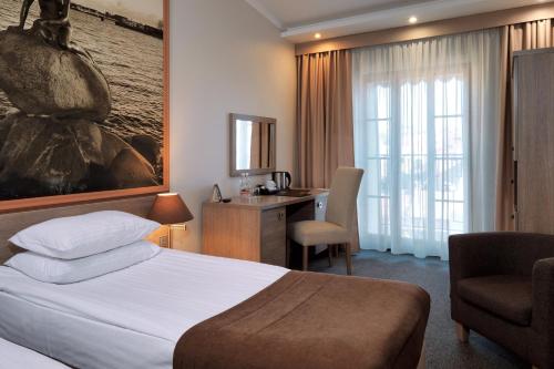 Rius Hotel Lviv — Balcony/Terrace