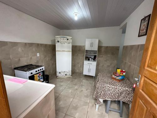 Køkken eller tekøkken på Cantinho no Vale