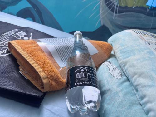 Postel nebo postele na pokoji v ubytování Cape Capsules