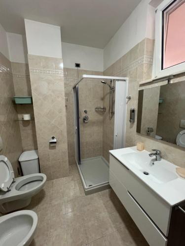 Koupelna v ubytování Alloggio Turistico - I tre Moschettieri - Zona Universitaria e Tribunale Nuovo