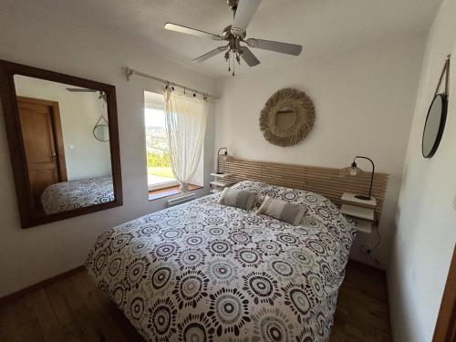 En eller flere senge i et værelse på Le Panorama