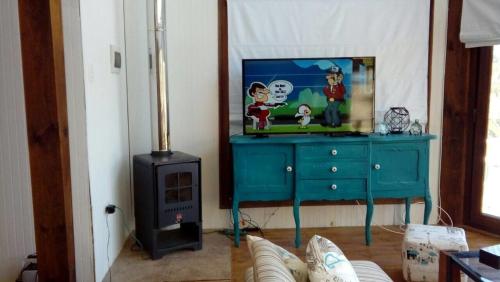 Et tv og/eller underholdning på Casa Lago Rapel Punta del Sol