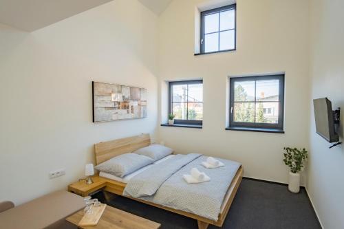 En eller flere senge i et værelse på Penzion pod Radhoštěm u Maléřů