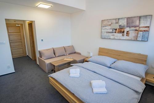 Et opholdsområde på Penzion pod Radhoštěm u Maléřů