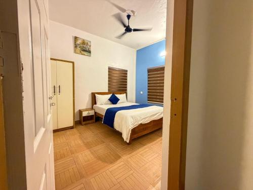 Ein Bett oder Betten in einem Zimmer der Unterkunft Vihara Inn Resort