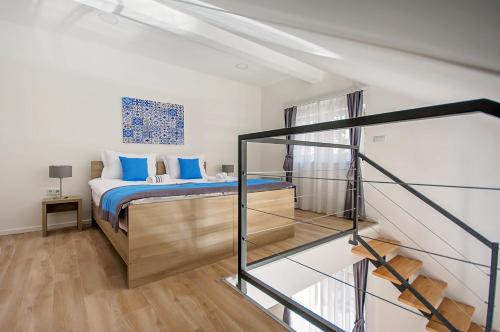 Llit o llits en una habitació de Enjoy Apartments