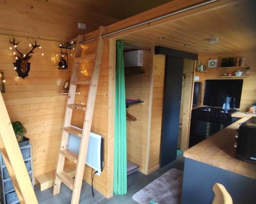 Kuchyň nebo kuchyňský kout v ubytování Tiny somniflore