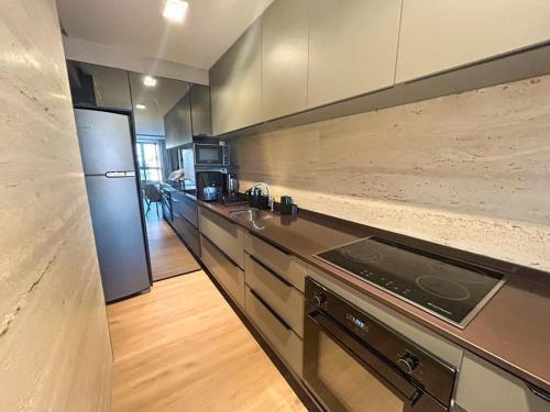 Küche/Küchenzeile in der Unterkunft Holanda's Prime