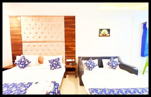 En eller flere senge i et værelse på The View Inn