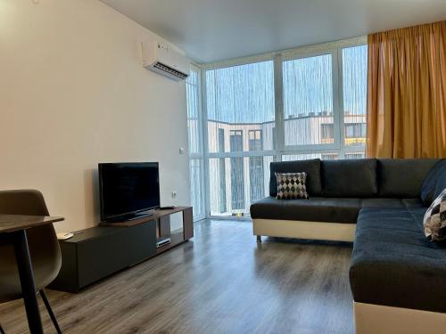 Posezení v ubytování Atlantis Resort & 4 swimming pools & Spa & Апартамент