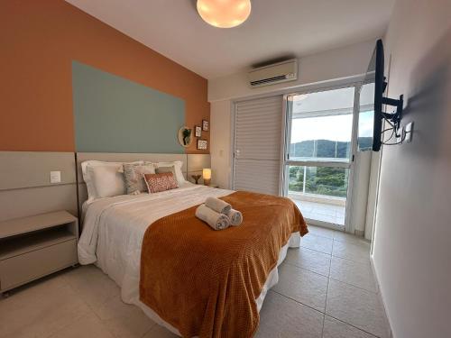 En eller flere senge i et værelse på Cyclinn Riviera All Time