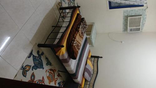 a set of stairs in a building with a colorful carpet at AJMAN HOME Stay ONLY FOR COUPLES FAMILY AND LADIES in Ajman 