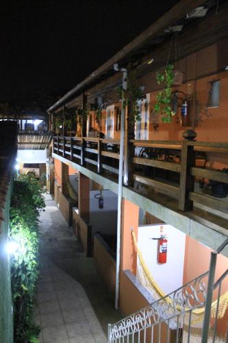 a view of a building at night at Pousada Mar & Vida e Doçaria in Paraty