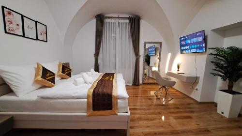 Voodi või voodid majutusasutuse Apartmány Farní toas