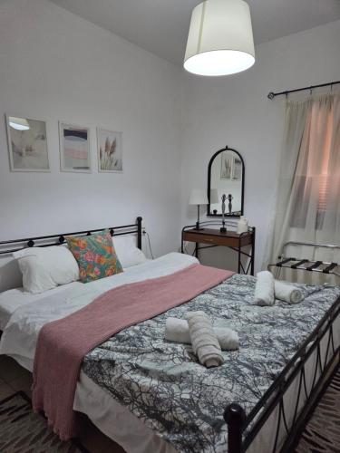 Postel nebo postele na pokoji v ubytování The Balcony of Meteora 2