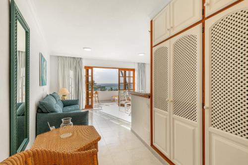 Posezení v ubytování Playa Delphin 302